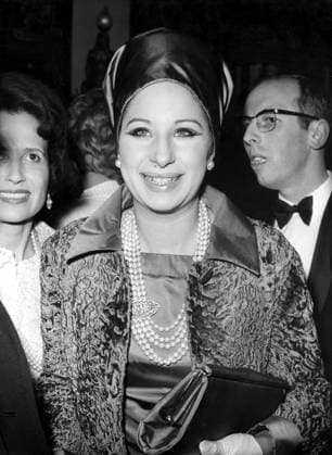 Orig. caption... FUNNY GIRL SEES ALFIE One of the world s highest paid performers America s Barbra Striesland, arrives at the Plaza Theater in London last night (Thursday) for the Gala Premiere of Alfie which stars British-born actor Michael Caine. Miss Striesland is here to appear in the hit musical Funny Girl. Alfie is Britain s entry for the Cannes Film Festival. Note B Streisand, b 1942, American singer, actor and film director Pearls Premieres Film premieres Makeup Eyeliner persons: Barbara Streisand sites: LONDON ;BRITAIN ;USA* sp_sw x5600x *** Orig caption FUNNY GIRL SEES ALFIE One of the world s highest paid performers America s Barbra Striesland, arrives at the Plaza Theater in London last night Thursday for the Gala Premiere of  Copyright: xXxXxXx STREISAND, BARBRA