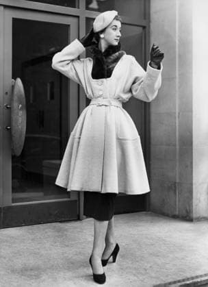 Orig. caption... ARTIC COLD The Top Twelve London Fashions Designers recently held their shows of autumn and winter coats, dresses and suits. Photographs of these are now released for publication on August 25th. Picture shows: Artic Circle is the name given to this three quarter length belted overcoat in a cream beige tweed made by The Galloway Reels. It is square cut with raised seams and inset beaver collar. Note Coats Outerwear Posing Berets Waist CD229 sites: LONDON ;UK sp_sw x5600x *** Orig caption ARTIC COLD The Top Twelve London Fashions Designers recently held their shows of autumn and winter coats, dresses and suits Photographs of these are now released for publication on August 25th Picture shows Artic Circle is the name given t  Copyright: xXxXxXx WASP WAIST