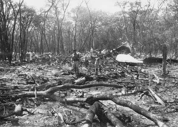 Orig. caption... MR. HAMMERSHIELD DIES IN AIR CRASH. Mr. Dag Hammarskjoeld, United Nations Secretary-General died in a plane crash near Ndola in Northern Rhodesia on Monday. The 56-year-old Secretary-General was to have met President Tshomhe of Katanga at Ndola for peace talks which, it was hoped, would bring about a cease-fire. Thirteen of the fourteen passengers and crew died when the aircraft crashed after a series of mid-air explosions. The sole survivor was a United Nations security guard. Photo shows: (Original just received in London) Officers inspecting the strewn wreckage. Trees had been felled by the aircraft as it crashed. Note D. Hammarskjöld, 1905-1961, civil servant, UN Secretary-General from 1953. Died in a plane crash in Nd  Copyright: xXxXxXx PLANE CRASH