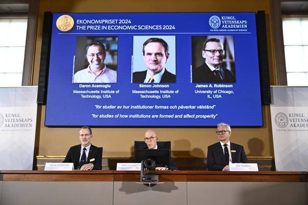 STOCKHOLM, SWEDEN 20241014 Permanent Secretary of the Royal Swedish Academy of Sciences Hans Ellegren, center, Jakob Svensson, left, and Jan Teorell, Nobel Assembly at Sveriges Riksbank, announce the Sveriges Riksbank Prize in Economic Sciences in Memory of Alfred Nobel 2024, awarded to Daron Acemoglu, Simon Johnson an  Copyright: xChristinexOlsson TTx NOBEL 2024 EKONOMIPRISET TILLKÄNNAGES kBD7uQvfyMU