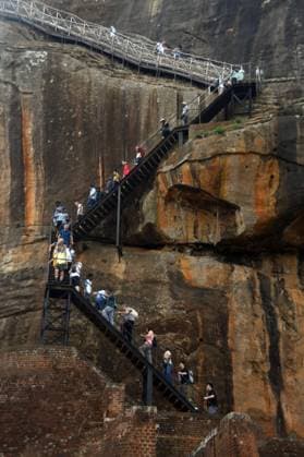 (241014) -- DAMBULLA, Oct. 14, 2024 -- Tourists visit Sigiriya Lion Rock, a popular tourist spot, in Dambulla, Sri Lanka, Oct. 14, 2024. (Photo by Xinhua) SRI LANKA-SIGIRIYA-LION ROCK AjithxPerera 