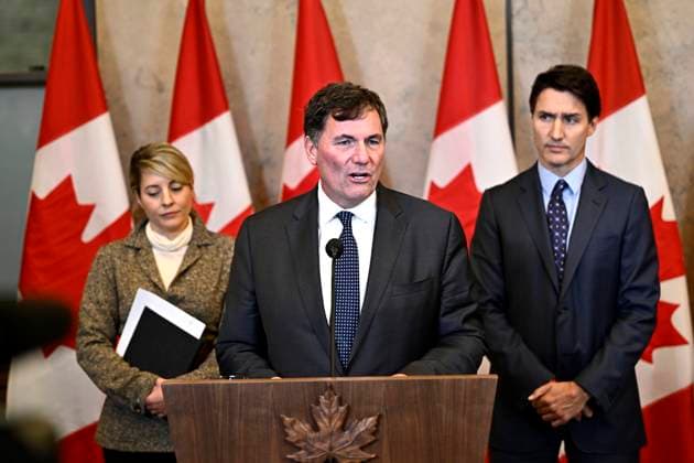 October 14, 2024, Ottawa, On, CAN: Minister of Public Safety, Democratic Institutions and Intergovernmental Affairs Dominic LeBlanc, centre, Prime Minister Justin Trudeau, right, and Minister of Foreign Affairs Melanie Joly participate in a news conference on the investigative efforts related to violent criminal activity occurring in Canada with connections to India, on Parliament Hill in Ottawa, on Monday, Oct. 14, 2024. Ottawa CAN - ZUMAc35_ 20241014_zaf_c35_051 Copyright: xJustinxTangx
