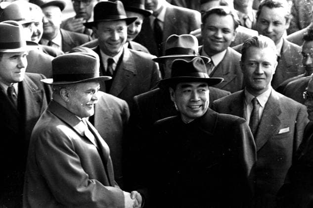 ORIGINAL CAPTION MOLOTOV AND CHOU EN LAI IN GENEVA M MOLOTOV, THE SOVIET FOREIGN MINISTER, ARRIVED IN GENEVA YESTERDAY FOR THE FAR EAST CONFERENCE OPENING ON MONDAY HE WAS MET AT THE AIRPORT BY MR CHOU EN  Copyright: xXxXxXx MOLOTOV AND ZHOU ENLAI