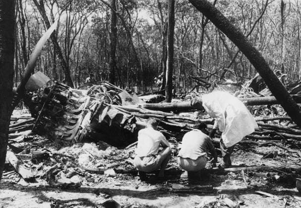 NORTHERN RHODESIA NDOLA 1961. Orig. caption... MR. HAMMARSKJOELD DIES IN AIR CRASH Mr. Dag Hammarskjoeld, the United Nations Secretary-General died in a plane crash near Ndola in Northern Rhodesia on Monday. The 56-year-old Secretary-General was to have met President Tshombe of Katanga at Ndola for peace talks which, it was hoped, would bring about a cease-fire. Thirteen of the 14 passengers and crew died when the aircraft crashed after a series of mid-air explosions. The sole survivor was a United Nations security guard. Photo shows: (Original just received in London). Officials searching for clues to the solution of the mystery among the wreckage of the aircraft and burnt trees. Note D Hammarskjöld, 1905-1961, civil servant, UN Secretar  Copyright: xx AIRPLANE WRECK