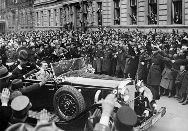 Orig caption BERLIN ON JANUARY 30, 1934, the first anniversary of the victory of the National Socialist movement and the assumption of power by Reich Chancellor Adolf Hitler The Führer after the audience with the Reich President von Hindenburg on the drive through the Wilhelmstrasse, greeted enthusiastical  Copyright: xx CHANCELLOR ADOLF HITLER