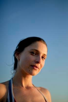 Creative Highlights Symbolfotos Portrait of a young woman with a serene expression against a clear blue sky at dusk. bola03240 Copyright: xConnectxImagesx ,model released
