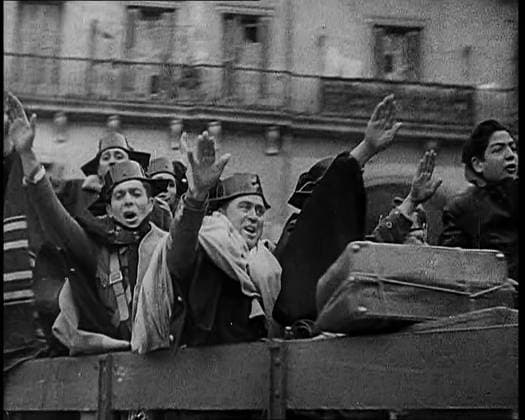 RECORD DATE NOT STATED Spanish Fighters on the Back of a Lorry Making Fascist Salutes and Celebrating the Victory of Nationalist Fighters Taking Madrid With Most of Them Wearing a Celebratory Tricornio of the Spanish Civil Guard, 1939. From Time To Remember - The Reluctant Warriors, 1939 (Reel 1); documentary about events of 1939 - preparations for war and then hostilities break out. Copyright:xBritishxPathexLtd HeritagexImagesxBritishxPathexLtdx IMAGO, ! ACHTUNG: AUFNAHMEDATUM GESCHÄTZT!  Copyright:BritishxPathexLtd HeritagexImagesxBritishxPathexLtdx IMAGO