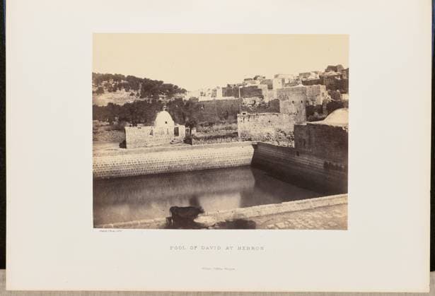RECORD DATE NOT STATED Pool of David at Hebron. John Cramb, photographer (Scottish, active 1850s - 1860s) 1860 View of King David s Pool, also called the King s Pool, in Hebron, surrounded by the brick walls and buildings of the city. Cattle sip from a trough beside the pool in the foreground. (Recto, mount) lower left, below print, letterpress in black ink: Cramb, Photo. 1860. Lower center, letterpress in black ink: POOL OF DAVID AT HEBRON. William Collins, Glasgow. (Verso, mount) lower left, handwritten in pencil: IB 51.6 (CRA) Copyright: xpiemagsx piemagsrmnb13020224-3554 !ACHTUNG AUFNAHMEDATUM GESCHÄTZT!