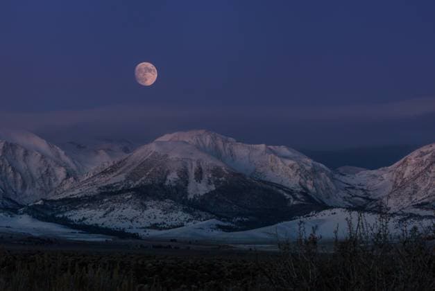 Moonlight Full moon rising above snowy mountains Copyright: xZoonar.com GalynaxAndrushkox 19996672