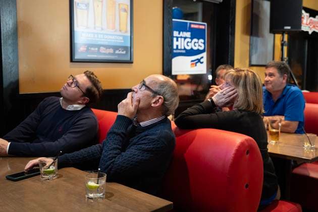 October 21, 2024, Quispamsis, Nb, Canada: Supporters of New Brunswick Progressive Conservative Party Leader Blaine Higgs watch results at a bar during the provincial election in Quispamsis, N.B., Monday, Oct. 21, 2024. Quispamsis Canada  - ZUMAc35_ 20241021_zaf_c35_098 Copyright: xDarrenxCalabresex