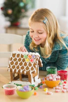 Grandmother with granddaughter (8--9) making gingerbread house , 03.10.2012, model released, TTBB_ti0153244.jpg, Grandmother,Granddaughter,Gingerbread House,70s,Girls,Cheerful,Christmas Decoration,Waist Up,8-9 Years,Senior Women,Two People,At Home,Food And Drink,Decorating,Toothy Smile,Multi Colored,Blonde Hair,Cheek To Cheek,Vertical,Indoors,Day,Childhood,Christmas,Happiness,Togetherness,Front View,Generation Gap,House Interior,Living Room,Casual Clothing,Caucasian Ethnicity,Arm Around Copyright: xTetraxImagesx