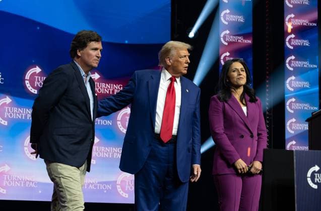 October 23, 2024, Duluth, Georgia, USA: Donald Trump greets Tucker Carlson and Tulsi Gabbard during massive rally of supporters at Gas South Arena Wednesday. Duluth USA - ZUMAn03_ 20241023_zaf_n03_037 Copyright: xRobinxRaynex