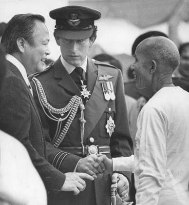 Prince Charles talking with an old Shadow Boxing player at Yuen Long Town Hall during his first official visit to Hong Kong, with him is Charles Yeung (left) Chairman of the Yuen Long Town Hall committee. 05MAR79 SCMP C. Y. Yu Hong Kong Hong Kong EDITORIAL USE ONLY  Copyright: xx 19790305571b9141 C.xY.xYux scmpphotostwo039249