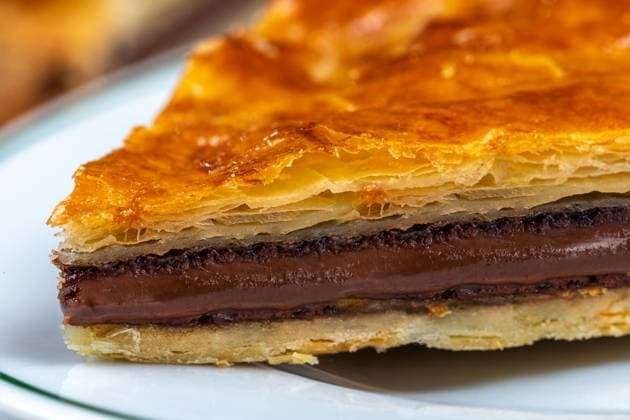 Galette des rois with frangipane eaten on January 6 for Epiphany. King cake 016386_024