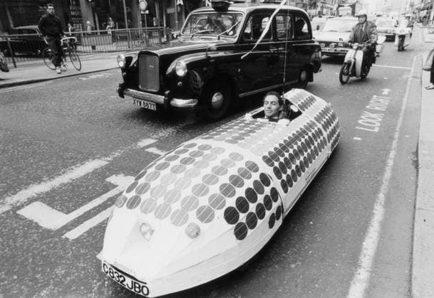 RECORD DATE NOT STATED Trans-European Solar Powered Expedition. Bruce Cro Trans-European Solar Powered Expedition. Bruce Cross driving the Sunrider through the rush hour traffic in Piccadilly - 15.05.1986. Copyright Tim Bishop The Times. Retrocon Transport Motoring.  Copyright: xTimxBishopx