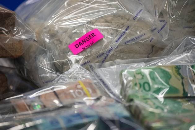 October 31, 2024, Surrey, Bc, CANADA: Fentanyl and cash seized last week are displayed before a news conference at RCMP headquarters, in Surrey, B.C., on Thursday, October 31, 2024. The RCMP says they have dismantled the largest and most sophisticated fentanyl and methamphetamine drug superlab in Canada, after an operation was conducted in Falkland, B.C., and Surrey beginning last Friday. Surrey CANADA - ZUMAc35_ 20241031_zaf_c35_098 Copyright: xDarrylxDyckx