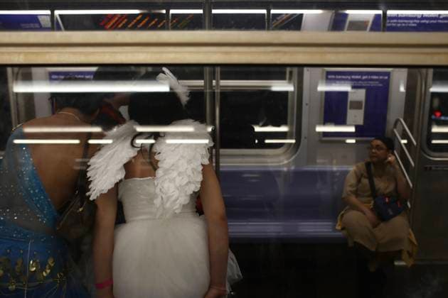 News Themen der Woche KW44 October 31, 2024, New York, United States: In the New York subway, travelers are dressed up for Halloween...The 51st Annual Village Halloween Parade took place in New York s West Village, marching down Sixth Avenue in Manhattan, New York. This year™s theme, Meow, invited participants to embrace all things feline, showcasing a wide array of cat-inspired costumes. Live music and performances added to the festive atmosphere. This year, the parade took on a political tone just days before the presidential elections, with costumes caricaturing Republican candidate Donald Trump. New York United States - ZUMAs197 20241031_aaa_s197_357 Copyright: xApollinexGuillerot-Malickx