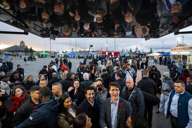 November 1, 2024, Brampton, On, CANADA: Prime Minister Justin Trudeau meets with Surinder and Iqbal Nahar, bottom middle, of Passion Profession Kitchen as he tours various vendors at the Diwali Mela festival at Sesquicentennial Park in Brampton, Ont., Friday, Nov. 1, 2024. Brampton CANADA - ZUMAc35_ 20241101_zaf_c35_070 Copyright: xAndrewxLahodynskyjx