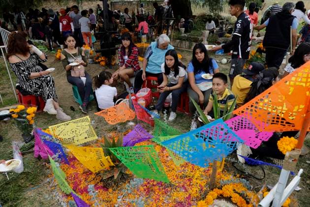 Day Of The Dead In Mexico People attend the Tecomitl community pantheon in Mexico City, Mexico, on November 2, 2024, and decorate the graves of their deceased loved ones with cempasuchil flowers and figures made from mud. According to belief, these will receive their souls during the Day of the Dead festivities on November 2. Mexico City Mexico  Copyright: xGerardoxVieyrax originalFilename: vieyra-notitle241102_npEpC.jpg