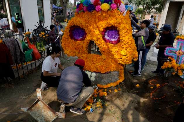 Day Of The Dead In Mexico People attend the Tecomitl community pantheon in Mexico City, Mexico, on November 2, 2024, and decorate the graves of their deceased loved ones with cempasuchil flowers and figures made from mud. According to belief, these will receive their souls during the Day of the Dead festivities on November 2. Mexico City Mexico  Copyright: xGerardoxVieyrax originalFilename: vieyra-notitle241102_npV10.jpg