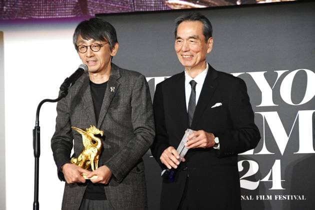 Bilder des Jahres 2024, Entertainment 11 November Entertainment Themen der Woche KW45 Tokyo International Film Festival, Preisverleihung Tokyo International Film Festival Japanese film director Daihachi Yoshida (L) makes a speech alongside actor Kyozo Nagatsuka at the Tokyo International Film Festival in Tokyo on Nov. 6, 2024, after his film Teki Cometh won the top prize of the Tokyo Gran Prix and the best director award and Nagatsuka, who starred in the film, won the best actor award.  A14AA0003693438P