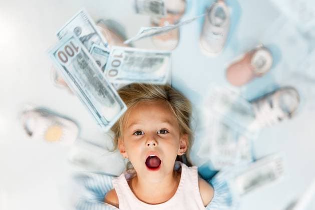 Creative Highlights Symbolfotos Child, dollar and shoes above with wow, excited or surprise look on face in mockup for saving, sale or retail shopping. Finance, money and investment for learning, financial and education of girl. model released property released Copyright: xwww.peopleimages.comx