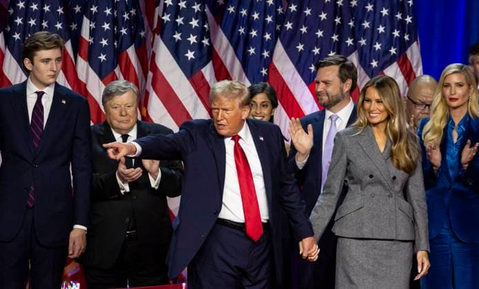 Trump Delivers Victory Speech - West Palm Beach NO FILM, NO VIDEO, NO TV, NO DOCUMENTARY - Republican presidential nominee former President Donald Trump, flanked by his son Baron Trump, JD Vance and his wife Melania Trump, points to the crowd after speaking during his election night party flanked by family and friends at the Palm Beach County Convention Center on Tuesday, November 6, 2024, in West Palm Beach, FL, USA. Photo by Matias J. Ocner Miami Herald TNS ABACAPRESS.COM West Palm Beach FL United States  Copyright: xMiamixHerald TNS ABACAx