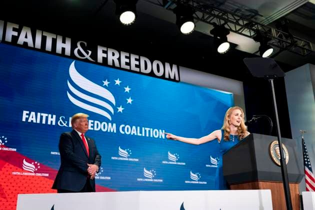 June 26, 2019, Washington, Dc, United States of America: U.S. President Donald Trump, left, listens to Natalie Harp, right, speak after inviting her on stage at a Faith and Freedom Coalition Road to Majority 2019 Conference at the Washington Marriott Wardman Park Hotel, June 26, 2019, in Washington, D.C. Washington United States of America - ZUMAp138 20190626_zaa_p138_005 Copyright: xJoycexN.xBoghosian WhitexHousex