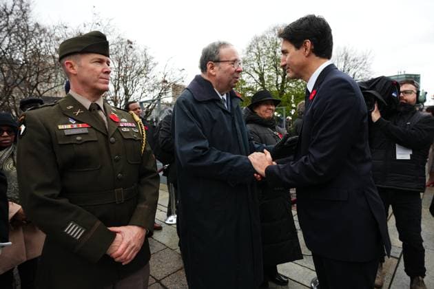 November 11, 2024, Ottawa, On, CAN: Prime Minister Justin Trudeau greets US ambassador to Canada David Cohen at a Remembrance Day ceremony at the National War Memorial in Ottawa on Monday, Nov. 11, 2024. Ottawa CAN  - ZUMAc35_ 20241111_zaf_c35_036 Copyright: xSeanxKilpatrickx