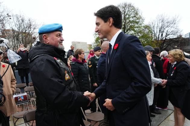 November 11, 2024, Ottawa, On, CAN: Prime Minister Justin Trudeau greets a veteran at a Remembrance Day ceremony at the National War Memorial in Ottawa on Monday, Nov. 11, 2024. Ottawa CAN  - ZUMAc35_ 20241111_zaf_c35_041 Copyright: xSeanxKilpatrickx