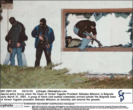 REF:2907-03 03 31 01 (c)Couple Globalphoto.com Special police forces storm the house of former Yugoslav President Slobodan Milosevic in Belgrade early March 31, 2001. A group of black-clad masked commandos arrived outside the Belgrade home of former Yugoslav president Slobodan Milosevic on Saturday and entered the grounds. belgrade  Copyright: xx