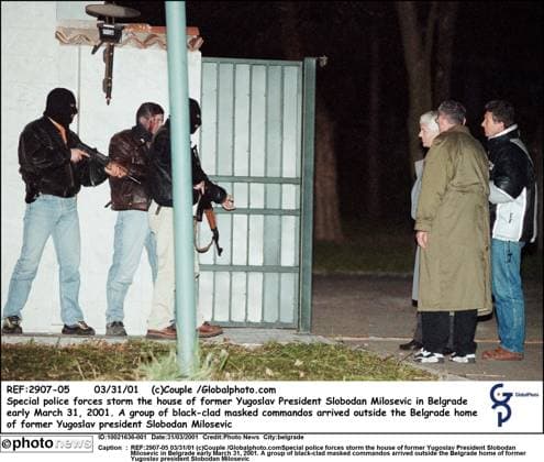 REF:2907-05 03 31 01 (c)Couple Globalphoto.comSpecial police forces storm the house of former Yugoslav President Slobodan Milosevic in Belgrade early March 31, 2001. A group of black-clad masked commandos arrived outside the Belgrade home of former Yugoslav president Slobodan Milosevic belgrade  Copyright: xx