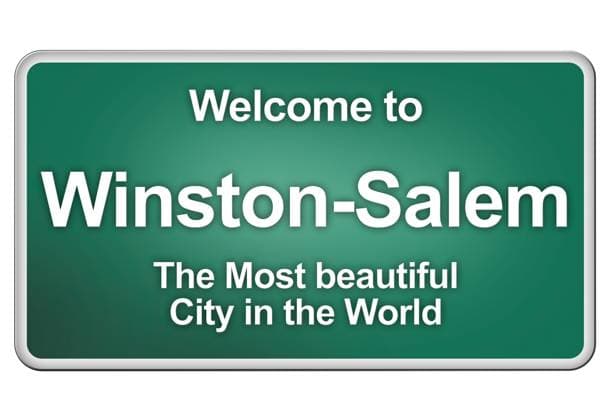 Welcome to us Green village sign with friendly Greetings Copyright: xZoonar.com AndreasxLudwigx 6601868