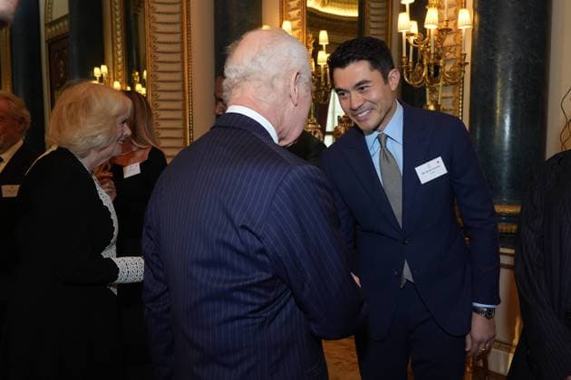 Centenary of the Film and TV charity King Charles III with Henry Golding during a reception to mark the centenary of the Film and TV charity, at Buckingham Palace, London. Picture date: Wednesday November 13, 2024. PA Photo. The Film and TV Charity was founded in 1924 as the Cinematograph Trade Benevolent Fund to help people working in the screen industries to overcome a spectrum of personal and professional challenges. The King became Patron of the Film and Television Charity succeeding Queen Elizabeth II, who had held the patronage since 1952., Credit:Aaron Chown Avalon UK, London  Copyright: xAaronxChownx xAvalonx 0934023479