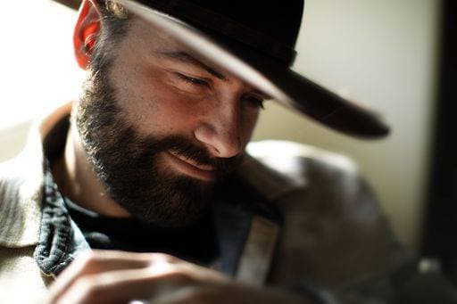 Creative Highlights Symbolbilder A bearded man wearing a wide-brimmed hat outdoors 27075168 ,model released, Symbolfoto RECORD DATE NOT STATED