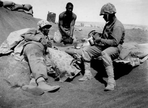 African-American Soldiers, Iwo Jima Island, March 1945 (b w photo) XRH1720217 African-American Soldiers, Iwo Jima Island, March 1945 (b w photo) by American Photographer, (20th century); (add.info.: On Iwo Jima island, march 1945 : African-American Willie J. Kanody, Elif Hill and John Alexander). Copyright: xBridgemanxImagesx 1720217