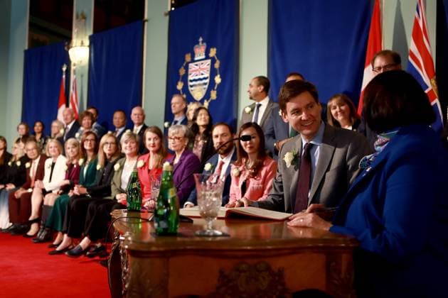 November 18, 2024, Victoria, Bc, CAN: Premier David Eby smiles towards Lt.-Gov. Janet Austin during the swearing-in ceremony at Government House in Victoria, B.C., on Monday, November 18, 2024. Victoria CAN  - ZUMAc35_ 20241118_zaf_c35_112 Copyright: xChadxHipolitox
