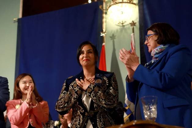 November 18, 2024, Victoria, Bc, CAN: Minister for Post-Secondary Education and Future Skills Anne Kang, left, and Lt.-Gov. Janet Austin look on as Deputy Premier and Attorney General Niki Sharma recieves a round of applause during the swearing-in ceremony at Government House in Victoria, Monday, Nov. 18, 2024. Victoria CAN  - ZUMAc35_ 20241118_zaf_c35_140 Copyright: xChadxHipolitox