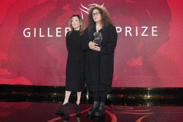 November 18, 2024, Toronto, On, CAN: Anne Michaels (right) stands with Elana Rabinovitch, the Executive Director of Giller Prize as she accepts the Giller Prize for her book Held at a ceremony in Toronto, Monday, Nov. 18, 2024. Toronto CAN  - ZUMAc35_ 20241118_zaf_c35_173 Copyright: xChrisxYoungx