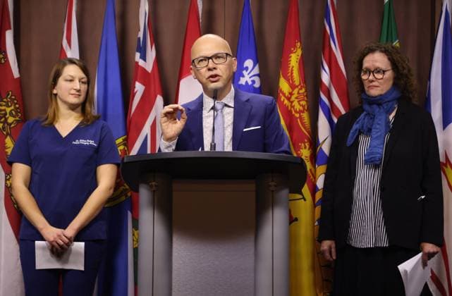 November 19, 2024, Ottawa, On, Canada: National director of policy and advocacy for the Canadian Health Coalition Steven Staples speaks at a press conference on Parliament Hill as chair of Canadian Doctors for Medicare Dr. Melanie Bechard, left, and media director of the Canadian Health Coalition Anne Lagace Dowson look on in Ottawa on Tuesday, Nov. 19, 2024. Ottawa Canada  - ZUMAc35_ 20241119_zaf_c35_032 Copyright: xPatrickxDoylex