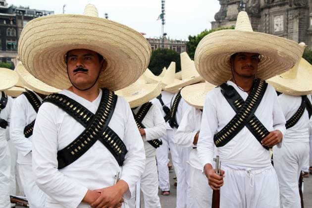 Parade 114th Anniversary Of The Mexican Revolution Members of the Mexican armed forces, dressed in attire from the era of the Mexican Revolution, pose before the parade for the 114th anniversary of the Mexican Revolution at the Zocalo capital, in Mexico City, Mexico, on November 20, 2024. MÃ xico City Mexico  Copyright: xJosexLuisxToralesx originalFilename: torales-notitle241120_npbYh.jpg