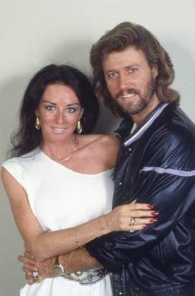 Singer and songwriter Barry Alan Crompton Gibb, member of the British band Bee Gees, poses with his wife Lina in Italy, 1984 Italy - ZUMAtory 19840101_aab_m169_054 Copyright: xAngeloxDeligiox