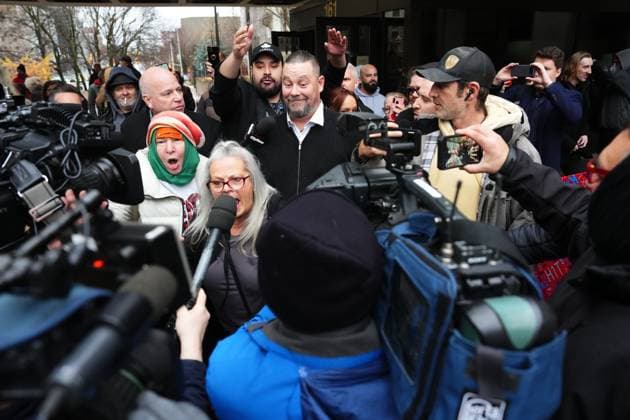 November 22, 2024, Ottawa, On, CAN: Freedom Convoy organizer Pat King is surrounded by supporters as he leaves court in Ottawa on Friday, Nov. 22, 2024. King, one of the most prominent figures of the 2022 convoy in Ottawa, has been found guilty on five counts including mischief and disobeying a court order. Ottawa CAN  - ZUMAc35_ 20241122_zaf_c35_034 Copyright: xSeanxKilpatrickx