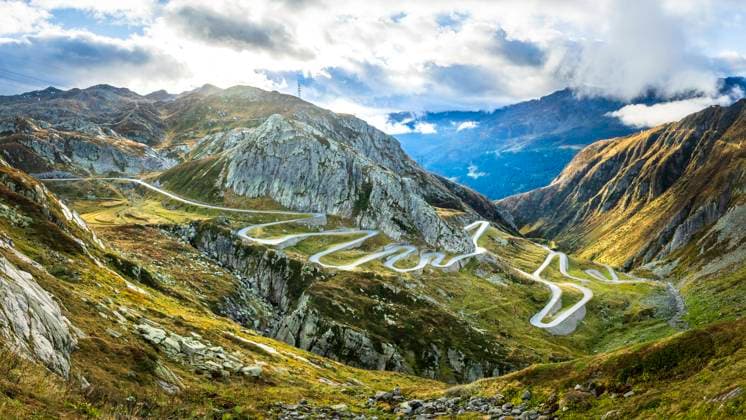 Scenic view of the winding Tremola road leading to Gotthardpass in the Swiss Alps, Kanton Tessin, Valley Leventina., STSF03873