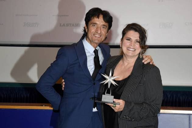 Turin: Turin: 42nd Turin Film Festival. Cinema Massimo. Red Carpet for the award La stella della Mole to Julia Ormond. In the photo: Giulio Base, Julia Ormond Turin  - ZUMAp169 20241127_zea_p169_548 Copyright: xMaurizioxD Avanzox