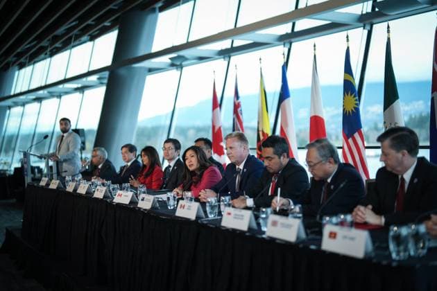 November 28, 2024, Vancouver, Bc, CANADA: Canada s Minister of Export Promotion, International Trade and Economic Development Mary Ng, centre left, speaks during the closing news conference at the Comprehensive and Progressive Agreement for Trans-Pacific Partnership (CPTPP) commission meeting, in Vancouver, on Thursday, November 28, 2024. Vancouver CANADA  - ZUMAc35_ 20241128_zaf_c35_095 Copyright: xDarrylxDyckx