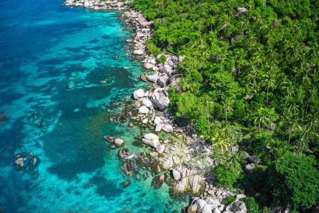 Aerial View Of Stone Coast And Blue Sea Aerial View Of Stone Coast And Blue Sea, Koh Tao, Thailand Copyright: xZoonar.com AlexanderxOzerovx 16615783