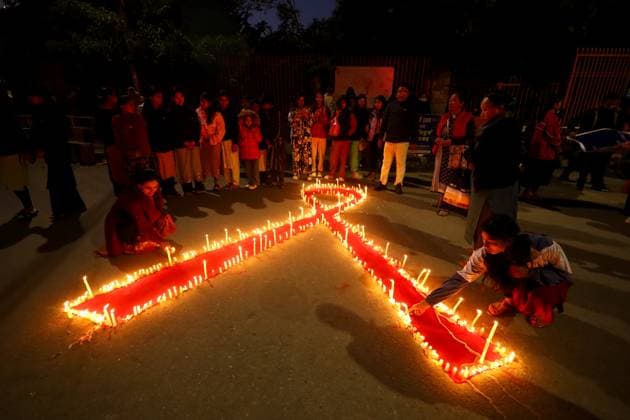 News Themen der Woche KW48 News Bilder des Tages Nepal Marks World AIDS Day Eve With Candle Light Vigil Nepali activists light candles arranged in a red ribbon shape during an awareness event organized on the eve of World AIDS Day in Nepal, on November 30, 2024. Kathmandu Nepal  Copyright: xSubaasxShresthax originalFilename: shrestha-nepalmar241130_npeDU.jpg