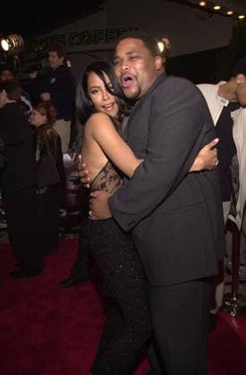 RECORD DATE NOT STATED Aaliyah and Anthony Anderson at the premiere of Warner Brother s ROMEO MUST DIE in Westwood, 03-20-00 , 10546768.jpg, couple, brunette, longhair, goatee, expressive, black, entertainment, celebrity, fame, people,