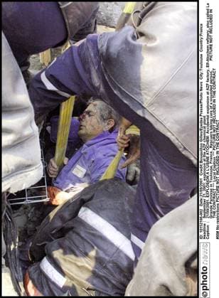 September 21, 2001: explosion at the AZF chemical plant 21 09 2001. EXPLOSION A L USINE ATOCHEM: Accidental explosion at AZF factory, Elf-Atochem refinery, also called La Grande Paroisse in Toulouse, France. Rescuers taking care of a wounded person. *** Local Caption *** Toulouse France  Copyright: xBouquillonxGillesx